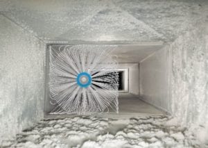 Rotating brush cleaning inside dusty air duct